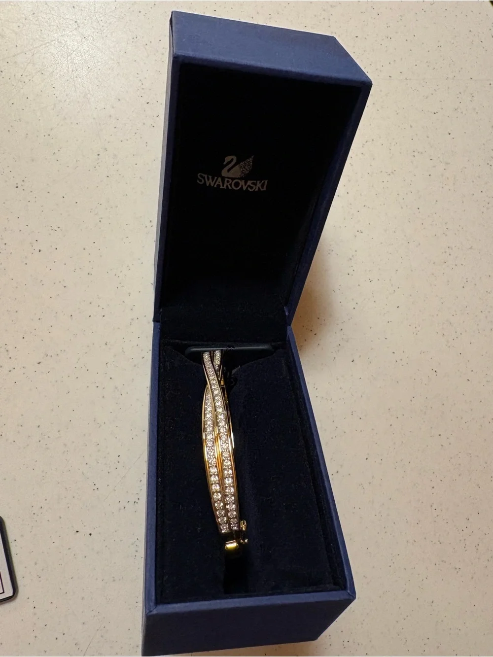Swarovski Gold-Tone Crystal Twist Bangle bracelet- never worn!!